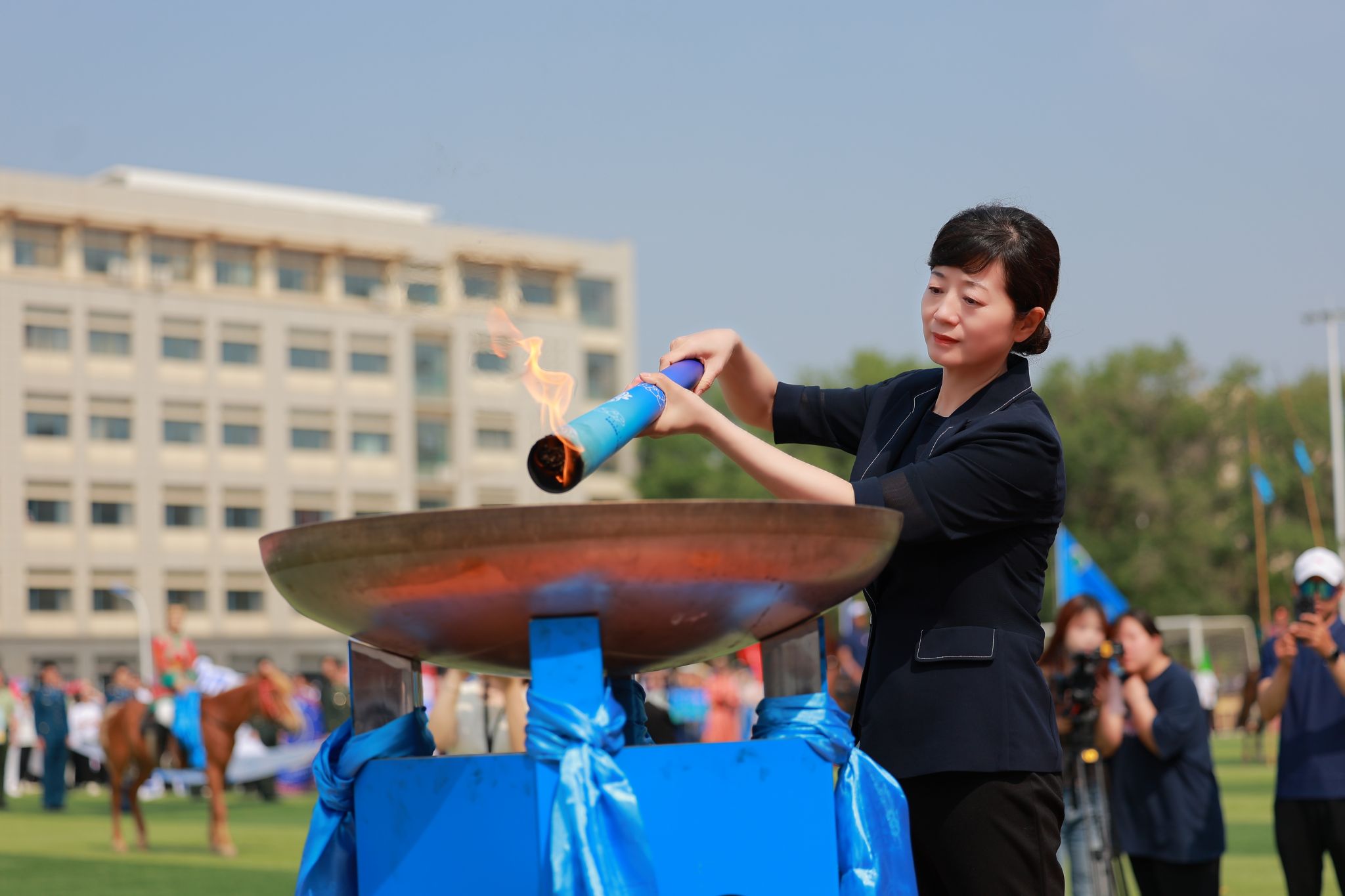 學(xué)校舉辦第十二屆校園那達(dá)慕文化節(jié)暨第六十一屆田徑運(yùn)動會開幕式